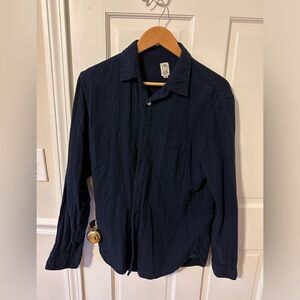 Men’s navy button down.